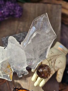 Clear Quartz Bat on a Stand