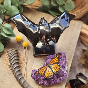 Nocturnal Rainbow Obsidian Bats on a Stand